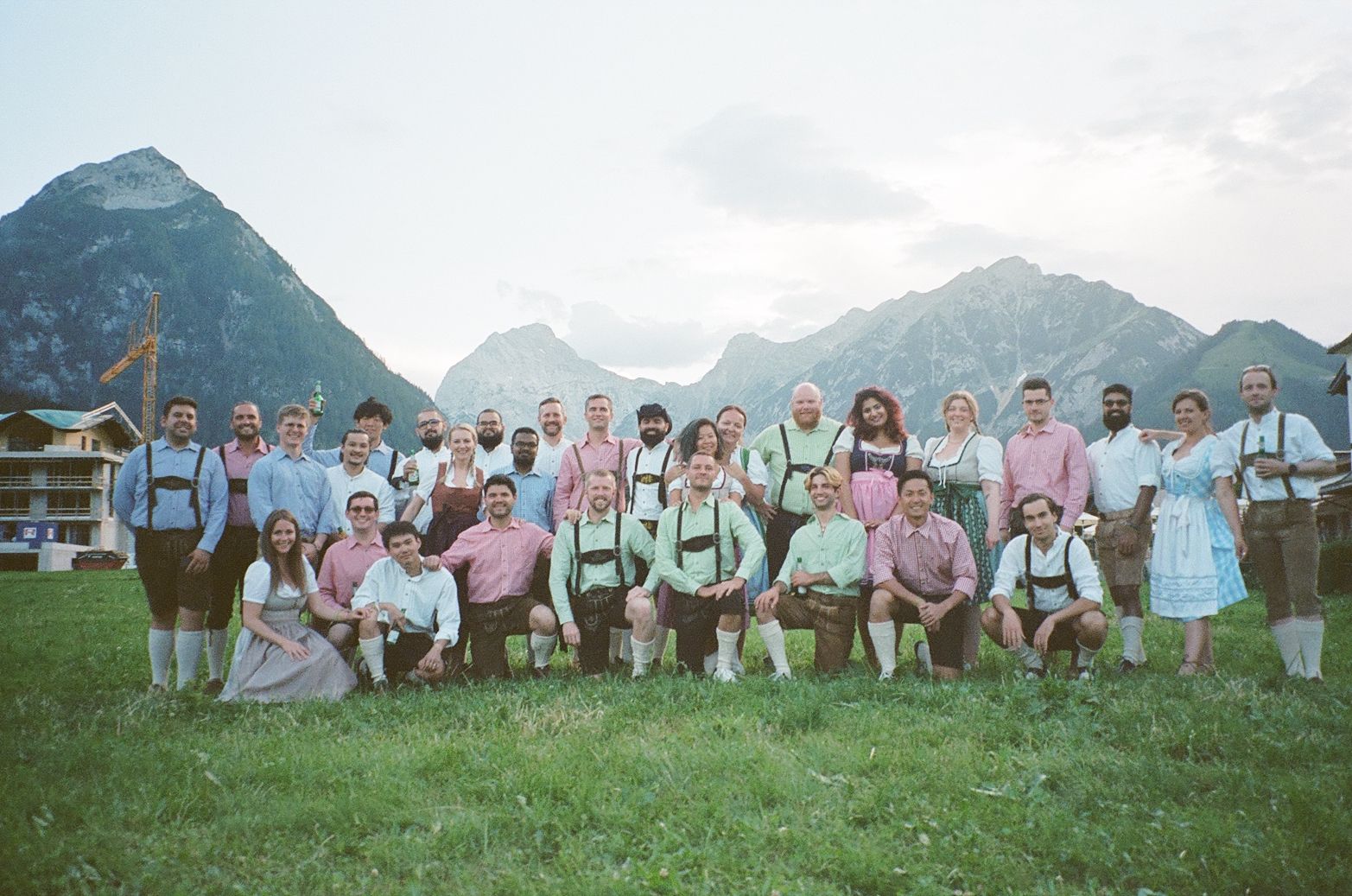 A photo of the Doist team in traditional Austrian clothing, with gorgeous mountains in the background. 